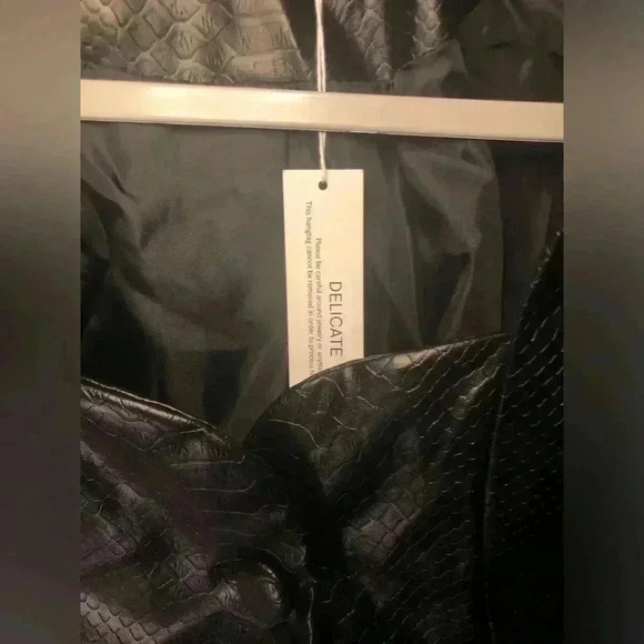 Chic Black Leather Jacket.
Snake Embossed Faux Leather Embellished Blazer - Picture 12 of 17